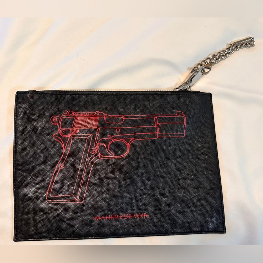 Manjeri Voir ShotGun Clutch